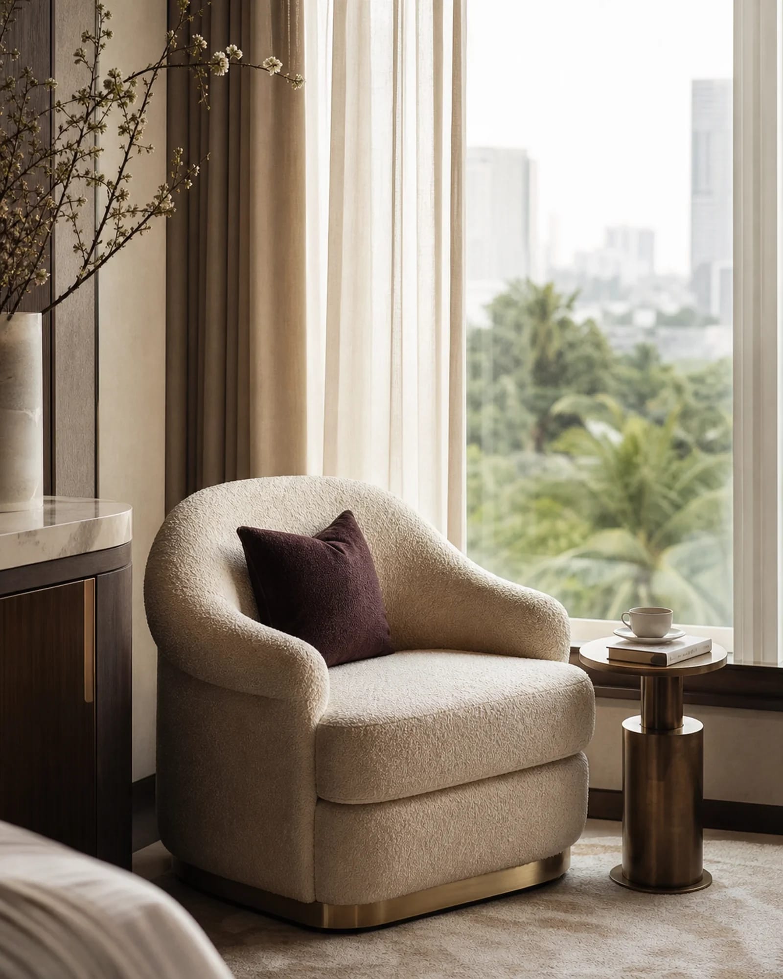 Nursing chair beside a window in warm light